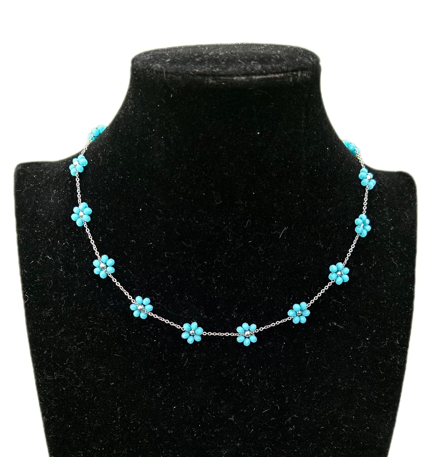 Collana in acciaio con fiorellini