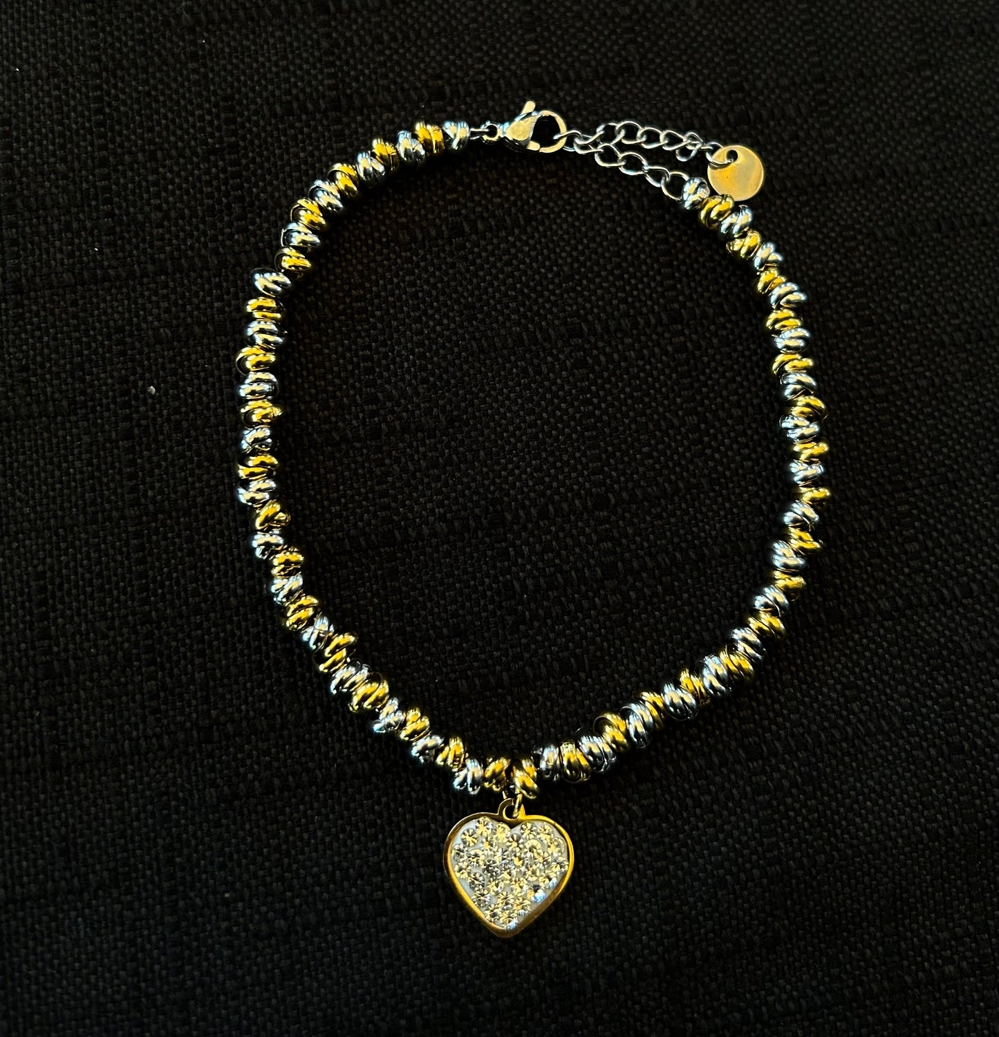 Bracciale nodini e cuore strass in acciaio