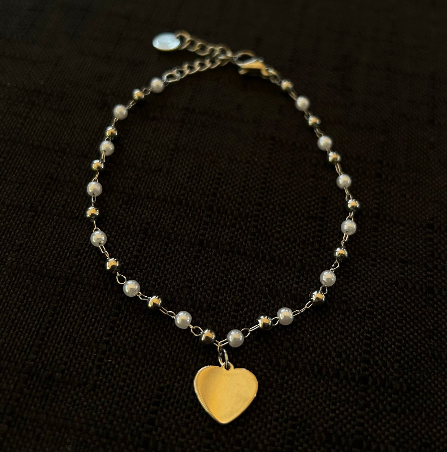 Bracciale con perline e cuore in acciaio