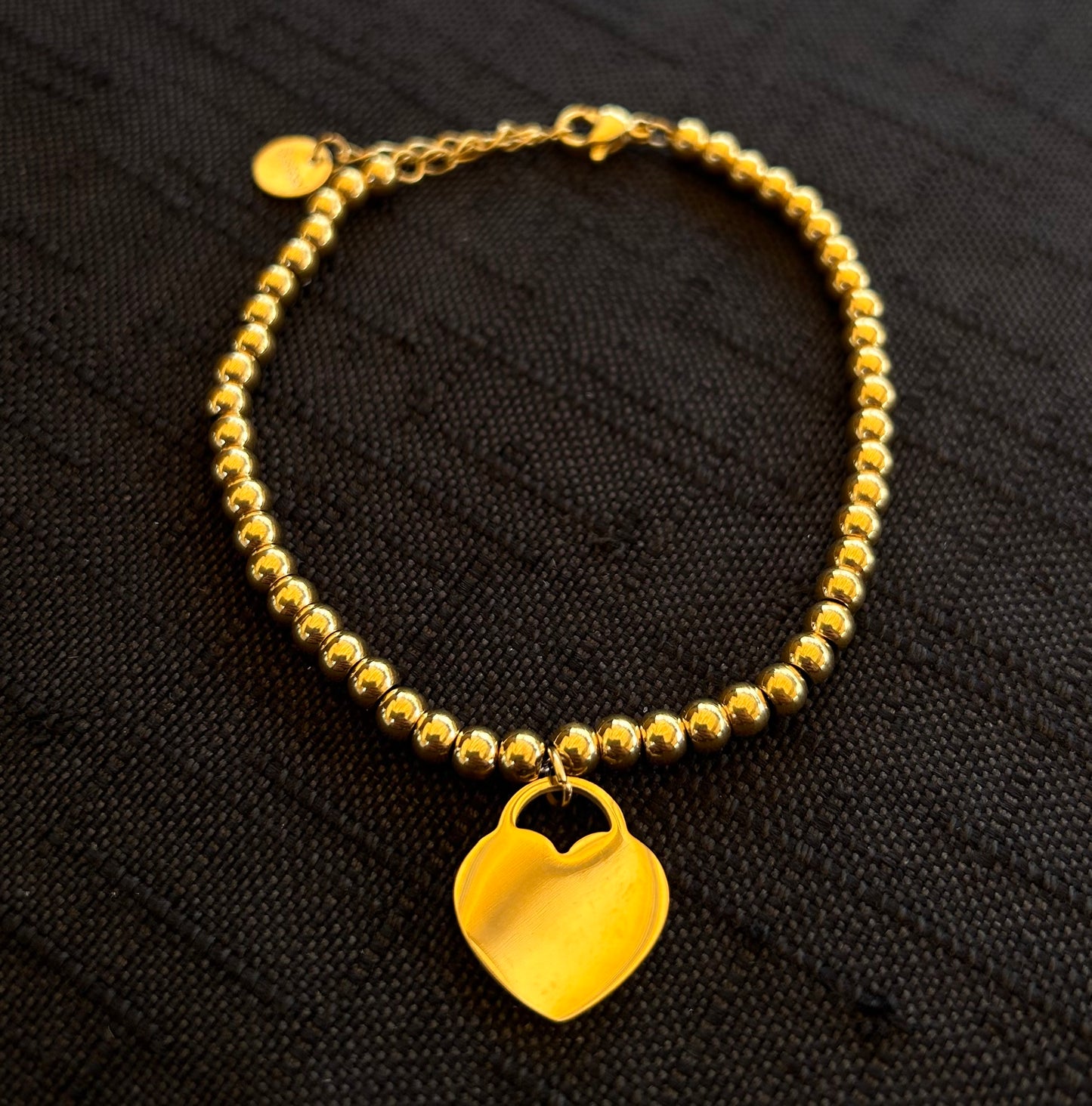 Bracciale con cuore grande oro in acciaio