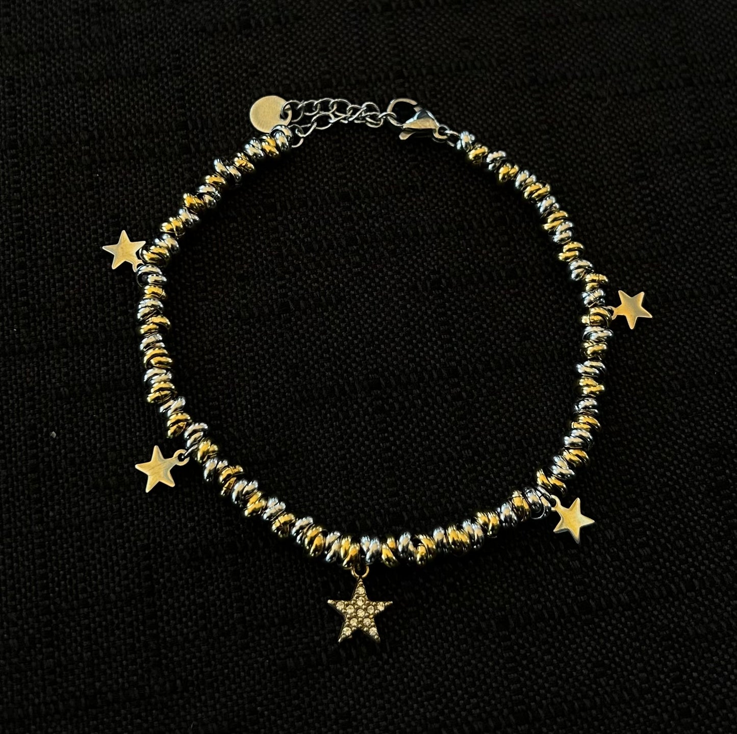 Bracciale nodini e stelline in acciaio
