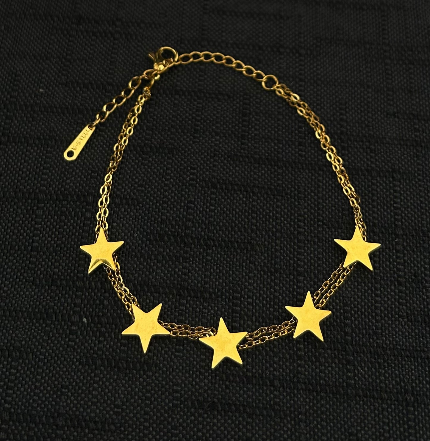 Bracciale con stelline oro in acciaio